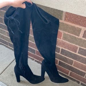 Black thigh high heeled booties